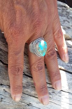 WANTED all over the Universe. Turquoise is recognized Sought After by early KINGS, MOVERS, and SHAKERS! Turquoise is said to be a vessel Imbued with energies associated with Heaven! All My Turquoise is Carefully chosen from around the World. I love the Raw Authentic look and feel of the stone...so I do not over polish the Turquoise! True Bohemian Style...an Original work of Art that you can treasure for a lifetime! Each of My Creations are One of A Kind and are Hand wrought to bring out the best Bohemian Turquoise Ring With Natural Stones, Bohemian Turquoise Ring For Festival, Turquoise Bohemian Ring For Festival, Southwestern Teardrop Jewelry For Festivals, Bohemian Turquoise Ring, Handmade Southwestern Teardrop Rings, Bohemian Teardrop Jewelry With Large Stone, Bohemian Teardrop Large Stone Jewelry, Southwestern Turquoise Teardrop Ring