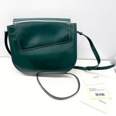 Nwt Valextra Green Leather Twist Crossbody Handbag Bag New With Tag Missing Dust Bag Missing Box Modern Crossbody Saddle Bag With Dust Bag, Elegant Green Saddle Bag With Adjustable Strap, Satchel Saddle Bag With Dust Bag For Evening, Elegant Crossbody Saddle Bag For Shopping, Green Office Bag With Magnetic Closure, Elegant Green Saddle Bag For Travel, Crossbody Shoulder Bag With Magnetic Closure For Shopping, Elegant Green Crossbody Saddle Bag, Valextra Bag