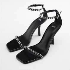 Genuine Zara New With Tag Color: Black/ Silver Sexy High Heel Sandals With Chain Trims On Front & Ankle Strap. 3.5 Inches Heel Height. Square Toes. Euro Size 38 Elegant Heels With Chain Strap For Night Out, Open Toe Heels With Chain Strap For Party, Chain Strap Open Toe Party Heels, Party Open Toe Heels With Chain Strap, Chain Strap Open Toe Heels For Parties, Party Heels With Chain Strap And Open Toe, Chic Chain Strap Heels For Evening, Black Sandals With Chain Strap For Party, Evening High Heel Sandals With Chain Strap