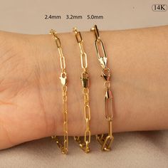 PLEASE READ FULL DESCRIPTION & SHOP POLICIES 14K Gold Paperclip Bracelet / Gold Paper Clip Chain Bracelet / Gold Layering Chain Bracelet / 14k Gold Chain Bracelet / Chain Link Bracelet ★★ Description ★★ Experience the modern elegance of our 14K Gold Paperclip Bracelet, a chic and versatile piece perfect for any occasion. Meticulously handcrafted from real 14K solid gold, this bracelet offers a sleek and contemporary look. Available exclusively in gold, it features a semi-hollow paperclip chain t Gold 14k Paperclip Bracelets, 14k Gold Paperclip Bracelets, Gold Paperclip Bracelet Tarnish Resistant, 14k Gold Link Charm Bracelet With Lobster Clasp, Paperclip Bracelet, Gold Chain Bracelet, Bracelet Chain, Gold Paper, Minimalist Bracelet