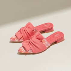 Summer Slides With Ortholite Insole And Slip-on Fit, Summer Slip-on Sandals With Low Heel, Pink Slippers With Removable Insole For Summer, Pink Textured Sole Slip-on Sandals, Pink Slip-on Sandals With Textured Sole, Spring Slip-on Slides With Arch Support, Pink Slippers With Rubber Sole For Summer, Summer Pink Slippers With Rubber Sole, Lightweight Spring Slides With Removable Insole