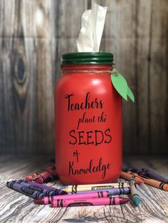 teachers plant the seeds of knowledge mason jar with tissue paper and crayons next to it