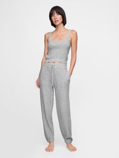 Supersoft cotton-blend pajama joggers.  Elasticized waist with drawcords.  Fit: Classic.  An easy silhouette that fits close  at the waist, and is relaxed through the hips and thigh.  Models wearing Gap Pajama Joggers, Easy Silhouette, Plush Yarn, Everyday Luxury, Everyday Luxuries, New Woman, Baby Toddler, Heather Grey, Gap