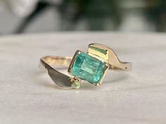 Colombian emerald ring,   14k gold,   Size 6 0.8 carats We only sell genuine natural emeralds directly from the Colombian mines of Chivor, Muzo, and Coscuez. The emerald mines of Chivor, Muzo, and Coscuez provide the best quality emeralds in the world because of their characteristics of color and clarity. The rarest and most expensive emeralds in the world have been discovered in these mines. Yellow Gold Emerald Ring With Tension Setting, 14k Gold Gia Certified Emerald Ring For May Birthstone, Formal Emerald Ring With Tension Setting For May Birthstone, Gia Certified 14k Gold Emerald Ring For May Birthstone, Emerald Jewelry With Tension Setting In Emerald Cut, Emerald Birthstone Ring In Yellow Gold, Fine Jewelry Emerald Ring With Tension Setting, Emerald Cut Emerald Jewelry With Tension Setting, 14k Gold Emerald Ring With Tension Setting