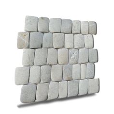 a wall made out of white rocks on a white background