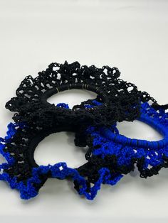 🎀Our 3 pieces of blue and black hair ties are gentle. They don't slide or come off, and you'll see that your ponytail remains in place the whole day minus the creasing a traditional scrunchie would provide. Dividend and softer material, fine texture, glossy and relaxing, stretchable and elastic. A more attractive look for all the girls and a creek of happiness for everyone. The best part is these hair ties won't damage your hair. Suitable for thick hair. 🎀These crochet ponytail holders are excellent hair supplements for buns, messy buns, ponytails, plaits, or pigtails. Each hair tie includes long-lasting elastic bands, smooth and comfortable to wear and fix your hair firmly. It is effortless to extract it without harming your hair. Long-lasting enough to be utilized for a long time. Thes Crochet Hair Bands, Scrunchies Crochet, Crochet Ponytail, Hair Supplements, Messy Buns, Hair Scrunchies, Crochet Hair, Ponytail Holder, Plaits