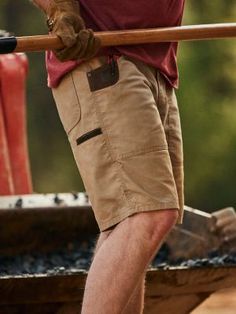 A SUMMER WARDROBE MADE FOR FUNCTION Those hot summer days can make the workday feel even longer than usual. Get your work wardrobe updated for the warm weather ahead with the Wrangler® RIGGS WORKWEAR® work shorts. Comfortable, practical, and built to last, these men's shorts feature just enough stretch to keep you moving comfortably, a gusseted crotch for maximum mobility, front patch pockets, and CORDURA® fabric-lined back pockets. These function-first shorts are perfect for a summer wardrobe t Summer Bottoms With Pockets For Outdoor Work, Rugged Relaxed Fit Cotton Bottoms, Casual Shorts For Outdoor Work, Cotton Shorts For Outdoor Work, Casual Bottoms With Hip Pockets For Outdoor Work, Cotton Shorts With Pockets For Outdoor Work, Rugged Relaxed Fit Bottoms For Outdoor, Wrangler Shorts, Cheap Clothes Online