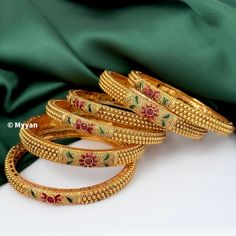 Matt gold rajwadi bangle chuda 6 pieces. Inspire your style with this Ruby and green antique gold chuda bangles for wedding,engagement or party. Ethnic traditional indian jewelry.  All orders Ship same day if placed before 4:00 PM EST  Create beautiful memory for any occasion with elegant jewelry for your loved ones We will be happy to navigate you through the process so if you have any questions regarding our product before placing an order reach out to us and we will be there to help you.  Thank you for your visit and support Traditional Kundan Bracelets For Marriage, Meenakari Bracelets For Marriage And Diwali, Meenakari Bracelet For Marriage During Diwali, Traditional Round Bridal Sets For Marriage, Festive Kundan Bangle For Marriage, Traditional Bangle With Tilla For Marriage, Traditional Kundan Bangle For Marriage, Traditional Bracelets For Marriage Festivals, Traditional Bracelets For Marriage