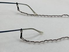 Easily keep your glasses around your neck with these dainty and fashionable beaded crochet glasses chains! They're comfortable enough for everyday use and for longtime wear. Take this chain to the beach to use for sunglasses too!  Available in multiple bead colors and finishes. The length of the chain is 26in. Crochet Glasses, Glasses Chains, Beaded Crochet, Glasses Chain, Gloucester, Bead Crochet, The Beach, Sunglasses, Beads