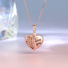 This photo necklace is perfect for making memories last forever. Don't miss this romantic and delicate piece! Unique, special and beautiful, this heart locket necklace is cleverly designed with one half engraved with "Love You" and one half designed as a floral totem. The necklace is crafted in sterling silver with stunning detailing, and with the addition of your own photo, this beautiful piece will be even more memorable.Weight: 4.9 gWidth: 17.6 mmHeight: 23.9 mmThickness: 5.1 mmMaterial: 925 Memories Last Forever, Vintage Locket, Heart Locket Necklace, Vintage Lockets, Photo Necklace, Necklace Online, Heart Locket, Making Memories, Locket Necklace