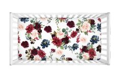 a white crib with red and pink flowers on the bottom, in front of a white background