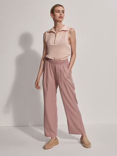 Made from super soft twill, these pants offer luxurious comfort with a relaxed, straight fit and an elastic waistband for easy wear. With a lightweight feel and a lovely drape, they're perfect for warmer days. Minimalist Summer Style, Minimalist Summer, Denim Outerwear, Pointelle Knit, Knit Vest, Swimwear Accessories, Easy Wear, High Waisted Pants, Half Zip