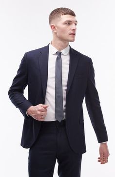 A lightly textured weave distinguishes this suit jacket tailored in a smart skinny fit and framed with handsome notched lapels. 30" length (size 42R) Notched lapels Chest welt pocket; front flap pockets Nonfunctional four-button cuffs Lined 64% polyester, 34% viscose, 2% elastane Dry clean Imported Eyeless Jack, Flap Pocket, Welt Pocket, Mens Suits, Mens Jackets, Suit Jacket, Dark Blue, Dry Clean, Nordstrom