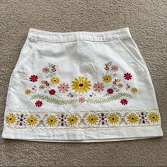 H&M Floral Skirt With Silver Back Zipper. Woven Floral Print On The Front. Great, Brand New Condition! Waist: 14 In. Length: 15 In. Spring Yellow Bottoms With Floral Embroidery, Yellow Floral Embroidery Bottoms For Spring, Yellow Bottoms With Floral Embroidery For Summer, Yellow Floral Embroidery Bottoms For Summer, Yellow Floral Embroidered Bottoms For Summer, H&m Lined Skirt For Spring, H&m Spring Lined Skirt, Embroidered Cotton Mini Skirt For Summer, Spring Bohemian Cotton Mini Skirt