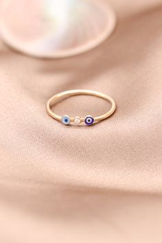 "Gold Evil Eye with Tiny Diamond Ring / Handmade Evil Eye Ring / 14k & 18k Evil Eye Ring Available in Gold, Rose and White Gold ❥ ITEM DETAILS ---> Gold Color of Choice : Yellow Gold, Rose Gold, White Gold ---> Material : 14k ( 585 ) or 18k ( 750 ) Real Gold. It is Not Gold Filled or Gold Plated ---> Made to order ---> Band Thickness : 1.25 mm ---> Band Width : 1.15 mm ---> Evil Eye Made of Enamel ---> Number of Diamond: 1 ---> Diamond Clarity: H Color SI/SI1 Clarity Fine Jewelry Rose Gold Enamel Ring In 14k Gold, Rose Gold 14k Enamel Ring Fine Jewelry, 14k Yellow Gold Enamel Ring Gift, 14k White Gold Enamel Ring As Gift, 14k White Gold Enamel Ring For Gifts, White Gold 14k Enamel Ring For Gift, White Gold 14k Enamel Ring As Gift, 14k Gold Yellow Gold Enamel Ring, Rose Gold Enamel 14k Ring As Gift