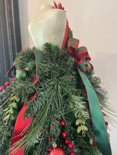 a decorated christmas tree with red and green ornaments