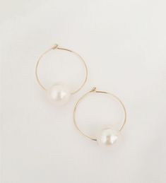 "Pearl Hoop earrings. Pearl Drop Loop Earrings. Gold Huggie Hoop. Pearl Huggie hoop. Minimalist Earrings. Big Pearl Loop Earrings. The endless hoop earrings are made using 14k gold-filled hoop and genuine 12mm highly lustrous pearl. These earrings are simple and yet timeless and you will love to wear them for any occasion. They are very lightweight and easy to wear. Grab a pair for your mom for Mother's Day or your best friend for her birthday! They even come ready in their own pretty gift box. Minimalist White Small Hoop Earrings, Minimalist Small White Hoop Earrings, Small Hoop Pearl Earrings For Everyday, Minimalist Hoop Pearl Earrings With Ear Wire, White Huggie Hoop Earrings With Ear Wire, Everyday Small Hoop Pearl Earrings, Minimalist White Small Hoop Pearl Earrings, Everyday Hoop Pearl Earrings With Ear Wire, Everyday Pearl Hoop Earrings With Ear Wire