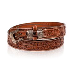 "Angela Lee buckle on Vogt running oak tooled leather belt. Buckle features stamped Navajo style design that is mirrored on loops and end piece. Stamped \"A. Lee, Sterling\" on back. Buckle has slight patina, belt is in like new condition. Belt could easily be replaced with alternate pattern from Vogt's inventory. Would complement a Western or Southwestern style nicely. Size: Belt 45\"L x 1 1/2\"W; Buckle 2\"L x 1 1/2\"W Inventory: AH0232 Family Owned & Operated Cisco's Gallery deals in the rare Hand Tooled Leather Belt Buckles For Rodeo, Hand Tooled Leather Belt Buckles For Ranch, Hand Tooled Leather Belts For Western-themed Events, Leather Concho Belts For Western-themed Events, Western Adjustable Engraved Belts, Western Engraved Adjustable Belt, Western Style Engraved Adjustable Belts, Western Style Adjustable Engraved Belts, Engraved Western Belt For Ranch