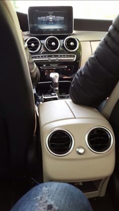 the interior of a car with speakers in it