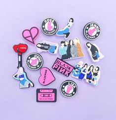 various stickers and magnets on a purple background with the words blackpink