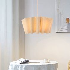 a dining room table with a white cloth on it