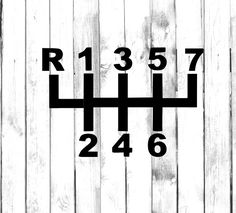 the numbers are arranged in black and white on a wooden background with vertical lines to indicate the time