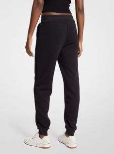 These classic drawstring joggers feature a logo-jacquard pattern for subtle texture and elevated appeal. Style them with the matching pullover for a coordinated off-duty look. Relaxed Fit Logo Waistband Joggers For Loungewear, Athleisure Joggers With Logo Detail For Loungewear, Casual Joggers With Logo Detail For Loungewear, Casual Joggers With Logo For Loungewear, Michael Kors Logo, Drawstring Jogger, Jacquard Pattern, Clothing Logo, Subtle Textures