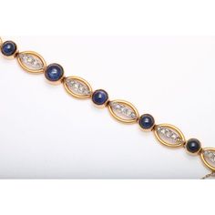 Beautiful 18k yellow gold bracelet featuring oval links with Rose cut diamond bars connected by cabochon sapphire buttons.  Please see the measurements noted above in the description for best approximate dimensions Luxury Gold Diamond Cabochons, Oval Gold Diamond Cabochons, Formal Oval Cabochon Rose Cut Diamond Jewelry, Formal Rose Cut Oval Cabochon Diamonds Jewelry, Elegant Gold Bracelet With Cabochon, Elegant Gold Bracelets With Cabochon, Elegant Formal Cabochon Bracelets, Gold Elegant Cabochons With Bezel Setting, Elegant Gold Cabochons With Bezel Setting