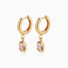 Our Antica Drop Earrings are a nod to timeless elegance, featuring bezel set genuine amethyst or blue topaz stones encased in 14k gold. This exquisite pair boasts ornate details, showcasing the fine Italian craftsmanship of a bygone era. Perfect for adding a touch of vintage sophistication. The Finer Points: Metal: 14 Karat Yellow Gold Stones: Genuine Amethyst or Blue Topaz Stones Dimensions: 20mm Total Length, 6mm Stone Diameter Weight: 2 Grams (Includes Stones) Origin: Crafted in Arezzo, Italy Formal Yellow Gold Hoop Earrings With Gemstones, Formal Yellow Gold Gemstone Hoop Earrings, Gold Elegant Hoop Earrings With Gemstone Accents, Luxury Gold Amethyst Earrings, Elegant Gold Hoop Earrings With Gemstone Accents, Gold-plated Yellow Gold Earrings With Gemstone Accents, Elegant 14k Gold Gemstone Hoop Earrings, Elegant Round Hoop Earrings With Gemstone Accents, Elegant Yellow Gold Hoop Earrings With Bezel Setting