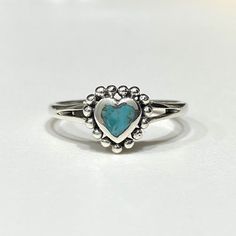 Vintage Sterling Silver Turquoise Heart Ring ...Marked 925...Weights 1.6grams...Size 7...Measure of Face 8.5MM...It's in very good condition. Heart-shaped Turquoise Ring, Heart-shaped Turquoise Blue Ring For Gift, Heart-shaped Blue Turquoise Ring Gift, Heart-shaped Blue Turquoise Ring For Gift, Heart-shaped Turquoise Ring For Anniversary, Blue Turquoise Ring For Anniversary, Dainty Style, Heart-shaped Turquoise Ring As Gift, Turquoise Gemstone Heart Ring For Anniversary, Heart-shaped Turquoise Sterling Silver Ring