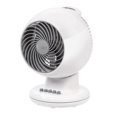 a white fan sitting on top of a table