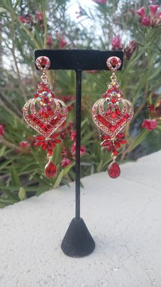 Red Crystal Earrings For Valentine's Day Party, Red Bling Jewelry For Evening, Red Glamorous Chandelier Earrings For Evening, Glamorous Red Chandelier Earrings For Evening, Red Crystal Dangle Earrings For Party, Red Crystal Dangle Chandelier Earrings, Red Crystal Chandelier Dangle Earrings, Glamorous Red Crystal Earrings For Party, Red Glamorous Chandelier Earrings For Party