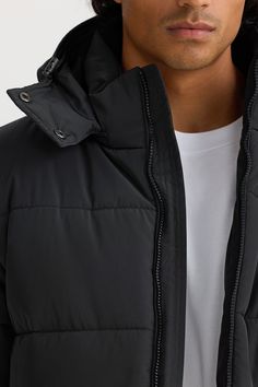 Embrace Winter in style with the Colorado Black Puffer Jacket. With a detachable hood and fleece lined pockets, this puffer is a wardrobe essential for the cooler months. Luxurious water resistant fabrication Fully lined Detachable hood Branded ORTC double ended zipper with powder coated press snaps for lapped closure Branded ORTC rubber patch on left arm In seam pockets with cosy fleece lining Ribbed cuff on sleeve 100% Polyester Designed in Australia. Made in China. Hooded Solid Color Puffer Jacket With Zipper, Solid Color Hooded Puffer Jacket With Zipper, Solid Hooded Puffer Jacket With Zipper, Solid Hooded Puffer Jacket With Zipper Closure, Black Hooded Nylon Puffer Jacket, Black Nylon Hooded Puffer Jacket, Hooded Puffer Jacket For Outdoor Activities, Hooded Puffer Jacket With Zipper For Outdoor Activities, Winter Nylon Parka With Zipper Closure