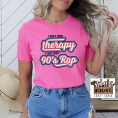 "Introducing our \"I Don't Need Therapy, I Just Need 90s Rap\" tee shirt! This shirt is the perfect way to express your love for the 90s hip-hop era while also making a bold statement about the power of music. The shirt features a simple yet striking design, with bold, block letters that spell out the phrase \"I Don't Need Therapy, I Just Need 90s Rap\". The words are printed in a classic 90s-style font, giving the shirt an authentic, retro feel. Made from high-quality, soft cotton, this tee shi Funny Therapy, 90s Rap, Funny Mom Shirt, Therapy Gift, Hip Hop Shirts, 90s Hip Hop, 90s Shirts, Spirit Shirts, Rap Tee