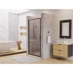 a bathroom with a sink, mirror and shower stall in the middle of the room