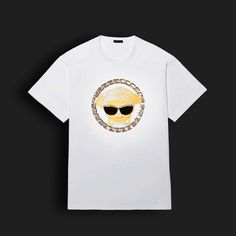 Next level statement T-shirts. Check out the new #Versace Emoji Tees and be sure to download the new iconic Emoji app. Post your 'Versace Emoji' creations using #VersaceSharesLove: http://goo.gl/LL3AiA Iconic Emoji, Statement Tshirt, Summer 2019, Next Level, Fashion Brand