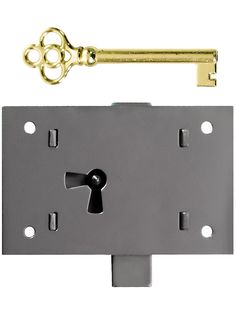 a key is attached to the back of a door with a lock on it and two keys