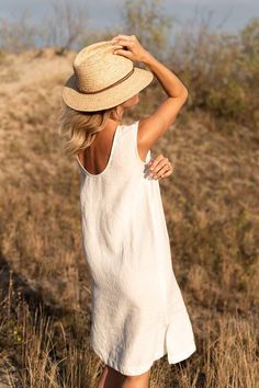 "DESCRIPTION: ♥ 100% natural European linen; ♥ safe Oeko-TEX® Standard 100 certified linen fabric ♥ softened midweight linen (185 g/m2) ♥ sleeveless dress FIT ♥ length from the lower to the upper seam is about 41.3 inches / 105 cm ♥ measurements taken from a size S ♥ model with long hair is 170 cm and wearing a size S ♥ model with shorter hair is 173 cm and wearing a size S SIZE CHART: XS: Bust 30.7\"- 32.7\" (78-83 cm) , Waist 23.6\"- 25.6\" (60-65 cm), Hips 33.5\"- 35\" (85-89 cm) S: Bust 33\" Spring Daywear Linen Dress, Spring Linen Dress For Daywear, Spring Linen Dress For Beach, Summer Linen Dress For Daywear, Summer Linen Midi Dress For Daywear, Spring Beach Linen Sundress, Summer Daywear Linen Dress, Linen Summer Dress For Daywear, Spring Linen Sleeveless Dress For Day Out