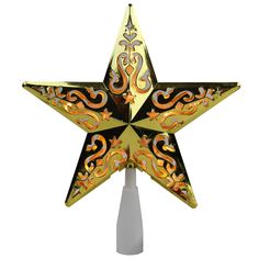 a gold and black decorative star on a white pole