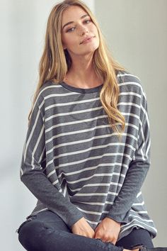 - Stripe mix oversize tunic top- Colorblock boxy fit- Round neck long sleeves- Stripe and solid Terry mixed- Model is 5' 10" 33-24-37 and wearing a Small- S/M/L 2-2-2- 65% POLYESTER, 32% RAYON, 3% SPANDEX- MADE IN U.S.A Style: Casual Print / Pattern: Stripe and solid Fit: Oversized Neck Line: Round neck Sleeve: Long sleeves Lining: No Made In: Made In U.S.AFabric Contents: 65% POLYESTER 32% RAYON 3% SPANDEXNon-sheer fabricCare Instructions: Machine wash cold, Do not bleachSize Measurement (inch) Trendy Oversized Color Block Top, Casual Gray Long Sleeve Top For Layering, Trendy Oversized Long Sleeve Top For Layering, Striped Oversized Top For Layering, Oversized Striped Sleeve Tops For Fall, Fall Relaxed Fit Top With Striped Sleeves, Relaxed Fit Tops With Striped Sleeves For Fall, Casual Oversized Tops With Striped Sleeves, Long Sleeve Color Block Tops For Layering