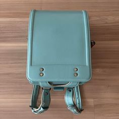 Randoseru : This randoseru made by Tsuchiya Bag company Which is one of the best randoseru maker in Japan. Its made by high quality Cowhide.  Item: Cowhide Leather school Bag / Japanese Randoseru - Light blue & White No.rnd012 Condition: Used/ Good. Please check the listing pictures. Size: Adult Wearable You could put your laptop without any ploblem. Tsuchiya Bag Company / Made in Japan Tsuchiya bag is one of the best randoseru maker in Japan. https://fujiyamarock.etsy.com Shipping Japan Post ta Rectangular Laptop Bag For Students, Portable Leather Backpack For Everyday Use, Functional Green Satchel For School, Functional Green School Satchel, Rectangular School Satchel, Functional Leather School Bag, Large Capacity Leather Softback Backpack For School, Rectangular Student Backpack, Green Rectangular Shoulder Bag For School