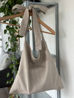 Linen tote bag with adjustable straps.  Made From European Linen. Great quality bag. Can be used for beach, shopping, casual everyday wear. Measurements are:  W41cm, H40cm.  Each handle length 93cm.  Custom size can be made upon request.  Thank you for visiting our store! Summer Style Double Handle Hobo Bag For Daily Use, Hobo Tote Bag With Adjustable Strap For Vacation, Summer Double Handle Hobo Bag, Summer Hobo Tote Bag With Adjustable Strap, Summer Hobo Bag With Double Handle, Summer Tote Hobo Bag With Adjustable Strap, Summer Hobo Bag With Adjustable Strap, Vacation Tote Hobo Bag With Adjustable Strap, Vacation Hobo Tote Bag With Adjustable Strap