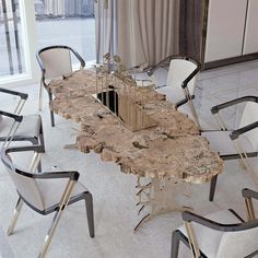 a dining table with chairs around it and a large piece of wood on the top