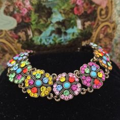 Michal Negrin Bracelet & Colorful Swarovski Crystal Victorian Flower Gift Box 7" | eBay Flower Shaped Rhinestone Jewelry For Gifts, Adjustable Multicolor Jeweled Bracelets, Multicolor Jeweled Crystal Bracelet Gift, Adjustable Jeweled Crystal Bracelet Gift, Bohemian Jeweled Multicolor Bracelets, Multicolor Party Jewelry With Flower Shape, Multicolor Flower Shape Jewelry For Party, Bohemian Multicolor Jeweled Bracelets, Multicolor Flower Shape Party Jewelry