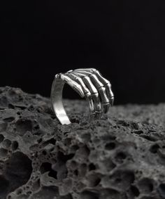 Material: S925 Sterling Silver Height: 14.0 mm Thick: 1.0 mm Weight: 5.8 g Please note: Each ring is made by hand so may differ slightly but the quality and workmanship are always the best. Your ring will come in a beautiful case, ideal for gifts or just storing your jewelry safely. It will be posted in an extremely secure package to make sure its safe arrival at your door. Thanks for stopping in my store. If you have any questions please fell free to contact me. best regards, Grunge Style Rings For Halloween Gift, Silver Grunge Rings For Halloween, Handmade Sterling Silver Skull Ring For Halloween, Silver Grunge Rings For Gifts, Silver Grunge Ring Jewelry, Punk Sterling Silver Skull Ring Gift, Punk Style Sterling Silver Skull Ring Gift, Punk Skull Ring In Sterling Silver, Handmade Silver Skull Ring For Halloween