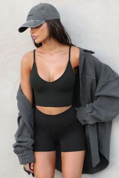 Spaghetti strap cropped tank with a u-neckline. Our FlexRib fabric was designed with comfort in mind. It's soft, stretchy and made to move with you. You'll want to wear it all day, everyday. Color: ﻿Vintage Black FlexRib Sizing: X/S (0-2), S/M (4-6), M/L (8-10) Model is 5'8" and wearing size X/S Fabric: 90% Rayon, 10% Spandex Care: Machine Wash Cold With Like Colors. Care: Lay Flat to Dry. Made in Los Angeles Sporty Cami Crop Top With Built-in Bra, High Stretch Crop Top With Built-in Bra, Trendy Crop Top With Built-in Bra For Loungewear, Solid Cropped Camisole With Built-in Bra, Casual Seamless Cropped Sports Bra, Sports Cami Crop Top With Built-in Bra, Versatile Crop Top With Built-in Bra And Medium Support, Stretch Cropped Camisole With Built-in Bra, Trendy Seamless Crop Top Sports Bra