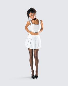 Add a little prep to your step in this two-piece set 💅 Featuring an ivory tweed bustier top and a white pleated tennis skirt - this fit is giving a chic and classy vibe that will have you looking top-tier 🤍 Trendy White Tennis Skirt For Party, White Mini Length Tennis Skirt For Party, Casual White Tennis Skirt For Party, White Mini Tennis Skirt For Party, Trendy White Pleated Skirt For Party, White Flirty Crop Top For Day Out, Flirty White Crop Top For Day Out, Flirty White Crop Top For A Day Out, White Pleated Mini Skirt For Night Out