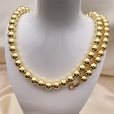 Beautiful Shiny Gold Chunky Necklace and Bracelet Set is Handmade in 14k Gold Filled Style  a Gift For Her.  This set makes an excellent Valentines Gift for Her. Free Shipping: *It is a Special Promotion for this item See All our Jewelry Styles, Findings, and Wholesale Jewelry Making Supplies Description: SKU 150734 - UPC:   * Style Making: 14K Gold Filled Style XO Gold Necklace  * Quantity: 1, 3, 6, or 12 pieces, select above. * Color: 14k Gold  * Weight: 18 x 0.4 x 0.4 x in * Dimensions: Neckl Formal Necklace With Gold Clasp, Formal Round Necklaces With Gold Clasp, Yellow Gold Necklace With Gold Clasp, Classic Yellow Gold Necklace With Gold Clasp, Classic Gold Necklace With Gold Clasp, 14k Gold Necklace With Gold Clasp, Gold Single Strand Necklace For Formal Occasions, Formal Gold Single Strand Necklace, Gold Plated Round Beads Jewelry For Formal Occasions