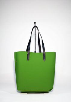 A fresh and modern style Neoprene Tote Bag-Green is made from high quality Neoprene.The minimalist design of this soft and sturdy tote bag suits any outfit and makes it a perfect every day bag. Ideal for the gym, study, travel, work, as baby bag or as an every day bag. Raw edges and no lining makes this style super light and easy to fold when traveling. Details:Color: greenMaterial: Soft neoprene Fits a laptop (up to 15 inch)inside zipped loose pocket to store your valuablesLeather shoulder stra Functional Green Shoulder Bag For Daily Use, Large Capacity Tote Diaper Bag For Shopping, Trendy Green Bucket Bag For Everyday Use, Functional Green Tote Bag, Versatile Canvas Shopping Bag With Handles, Large Capacity Satchel Diaper Bag For Shopping, Functional Green Canvas Shoulder Bag, Large Capacity Shoulder Diaper Bag For Shopping, Large Capacity Diaper Bag Satchel For Shopping