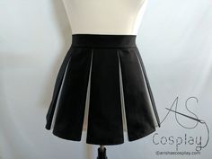 "This pleated skirt, with peek-a-boo style pleats, features one color on the outside of the pleats and another color peeking out from the inside. It is available in any two colors of your choice and is available in any size from petite to plus sized. Pair this skirt with a black tank top for a cheerleader look or achieve an entirely different look by pairing it with the corset front strapless top (available separately) shown in the last photo. This fun skirt is very versatile. Add a Matching Fac Fitted A-line Pleated Tennis Skirt, Box Pleat Skirt For Party, Fitted Box Pleat Party Skirt, Fitted Box Pleat Skirt For Party, Black Pleated Skirt For Cosplay, Party Fitted Box Pleat Skirt, Cosplay Black Pleated Skirt, Fitted Pleated A-line Tennis Skirt, Black Fitted Skirt With Accordion Pleats